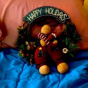 Craft market holiday wreath with stuffed reindeer